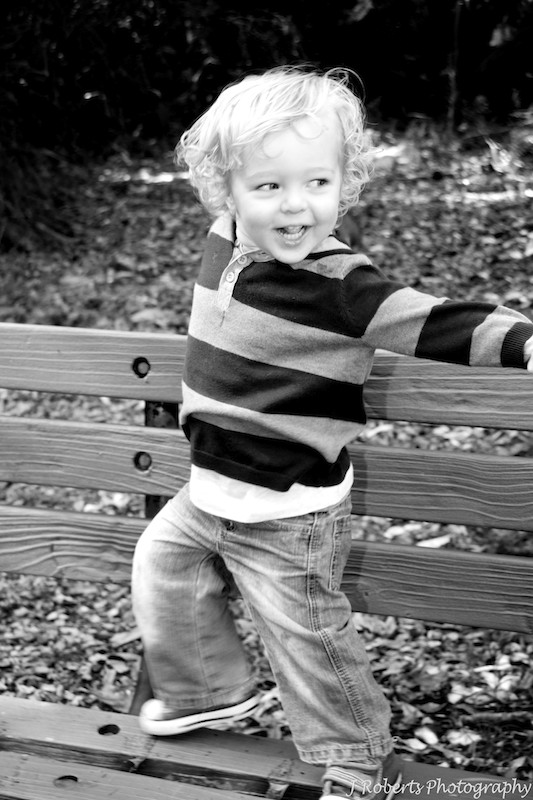 B&W of cheeky little boy - family portrait photography sydney